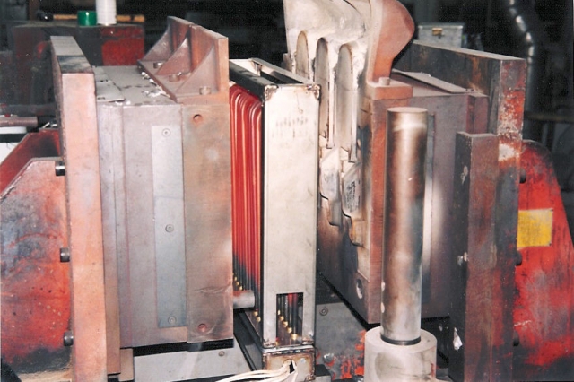 Above is a photo of an Aitken Electric Infrared Die Heater being used in a Permanent Mold application. For Die Heater models available please refer to Electric Infrared Die Heaters category on previous page Permanent Mold Die Heaters